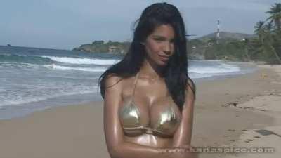 Karla Spice in golden bikini