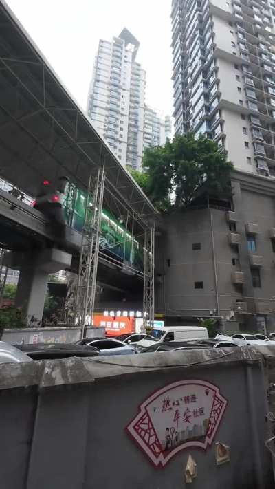 A man shows his commute to work in Chongqing.