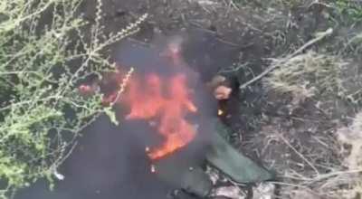 Russian soldier burning alive after the drone strike.