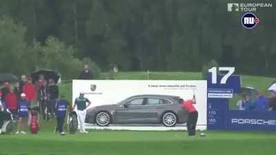 Man wins Porsche with a hole in one