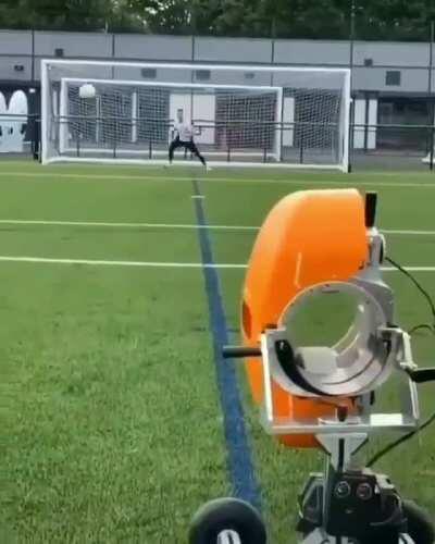 Specialized ball launcher that trains goalies