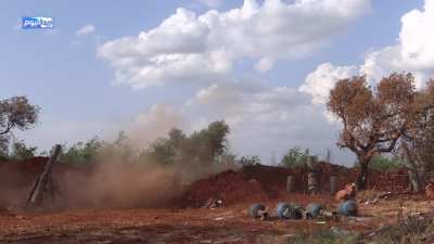 Syrian rebel mortar position firing a barrage during fighting for Jabal Arbaeen near Ariha, Idlib. Includes heavy improvised &quot;hell cannons&quot;. Claimed from May 12 2015.