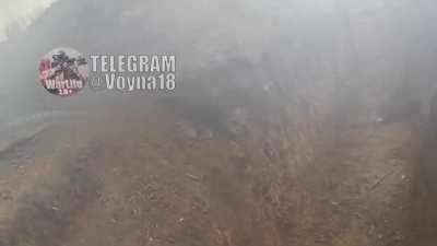 Headcam showing Russian soldier attempt and fail to shoot down an incoming Ukrainian FPV drone