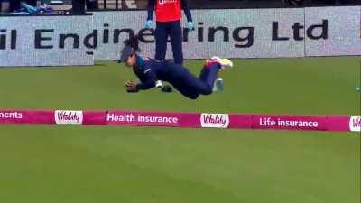 Cricketer stops a maximum, and then takes a supreme catch