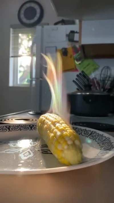 The camera caught the light reflecting off the water droplets of the steam at the right angle to make magical corn.