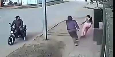 Trying to rob a lady