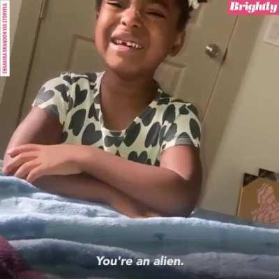 5-year-old girl thinks mom’s passport proves she’s an alien