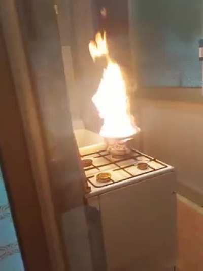 WCGW throwing water at a burning pot (Original video of what happened inside my rental home while I was in my room listening to Skyrim music. Those featured in the video are my roommates).