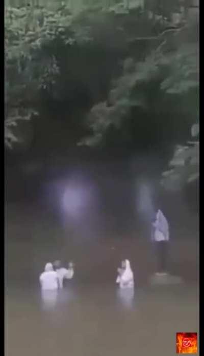 Real Footage of Angels Caught on Tape in a River Baptism