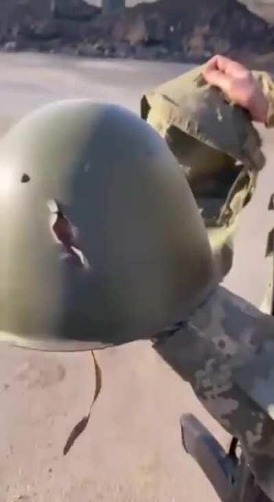 Russian &quot;tactical&quot; helmet is actually WWII &quot;tin can&quot;... already punctured