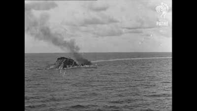 The battleship HMS Barham explodes as she capsizes after being fatally torpedoed, 25 November 1941