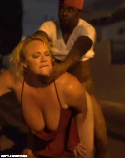 Blonde top heavy milf in a red dress can't wait and gets her cheeks clapped in public