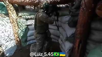 Brazilian soldiers of the International Legion defending their trenches in the direction of Kreminna with suppressive fire. August 2024.