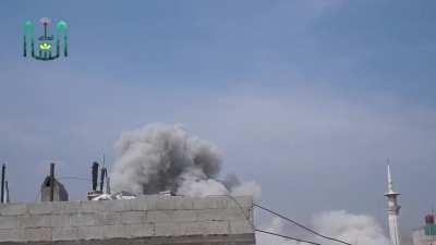 Camera on the ground captures the impact of an SyAAF air strike on Douma - 4/13/2014