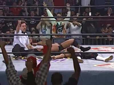 Dean Malenko hits a super gutwrench powerbomb on Rey Mysterio Jr.