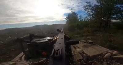 Ukrainian gunner in a M113 armored personnel carrier shooting somewhere in Kherson Oblast