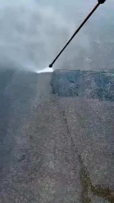 My husband power washes semitrucks and sent me this video of him cleaning up an oil stain at his shop