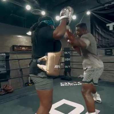 Francis Ngannou training with Mike Tyson