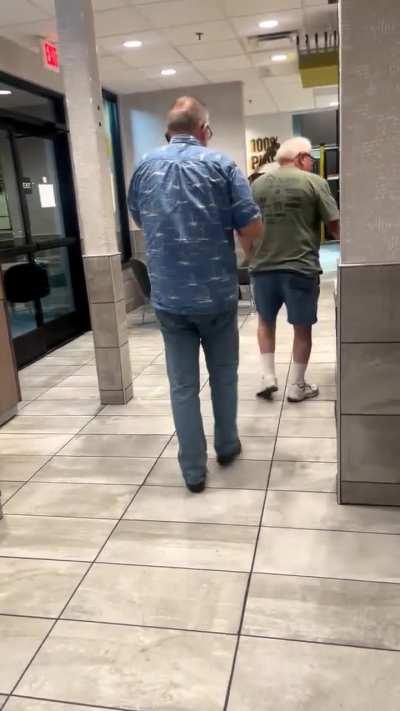 Two old dudes fighting at McDonald’s.