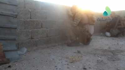 Iraqi military skirmishes with IS forces in Mosul with an Iraqi sunset as backdrop - 2016