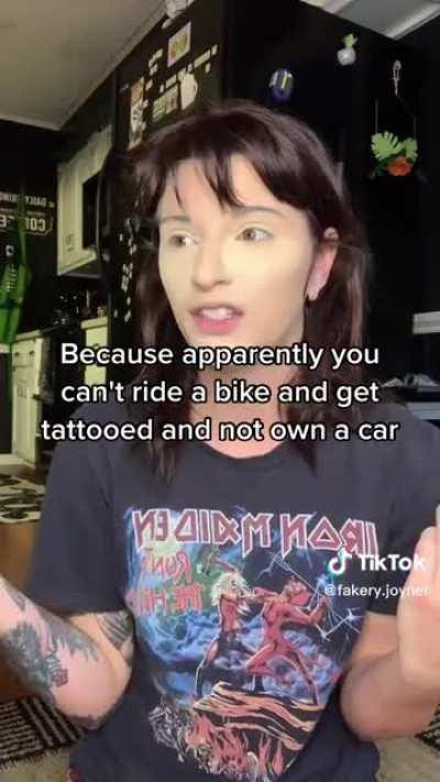 Says paying for a car is spending money on “stupid stuff”, yet regularly gets tattoos and DoorDash while relying on others to drive her places.