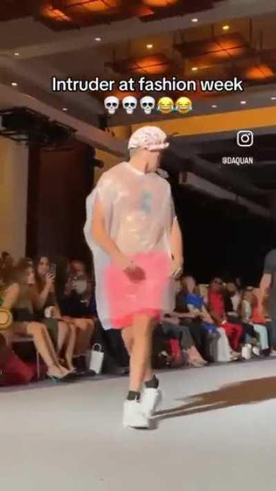 Dude snuck into a fashion show wearing a trash bag 