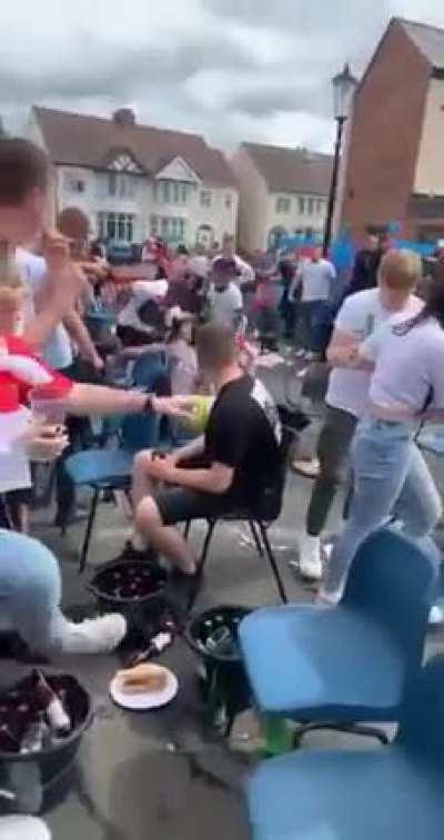 English fans enjoying the occasion by having friendly fights with each other