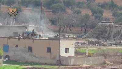 TOW strike against Pro-Government forces HMG and ATGM position on the al-Jour axis in Eastern Idlib province conducted by the National Front for Liberation. 27th December 2019 (Syria)