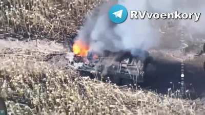 A Ukrainian APC is seen burning in the Kursk Region - October 2024