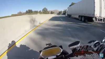 Man narrowly escapes from being run over by semi truck.