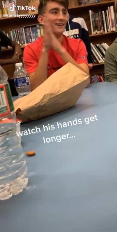 Watch his hands get longer...