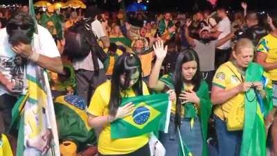 Bolsanaro supporters crying and praying after Lula's victory in the Brazilian presidential election