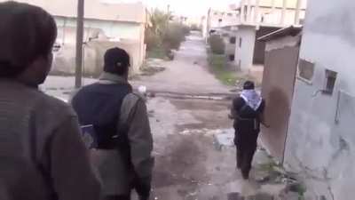 Syrian reporter embedded with Opposition fighters is the second man to cross the street &amp;amp; subsequently wounded - 2013