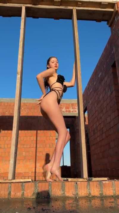 Teasing in a Stringy Black Bikini / One-Piece (Stefania Deriabina HD Clip)