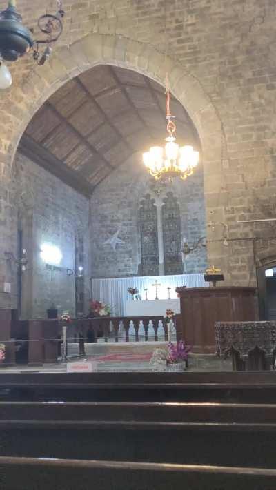 Stuck during heavy rain for 3 hours in a Catholic cathedral built by colonialists in the 19th century, . Dharamshala, Indian Himalayas.