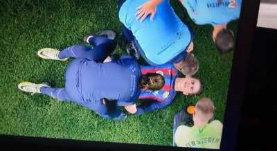 Gavi receiving treatment on the pitch