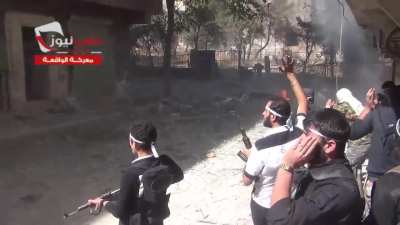 FSA fighters attempt to suppress SAA positions while moving through the Salah al-Din Neighborhood, Aleppo - 10/9/2013