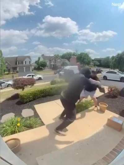 Porch Pirating is getting competitive - two thieves try to claim the same package seconds after it was delivered 