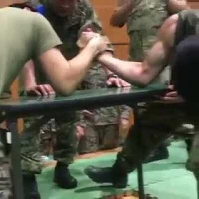 Marine dislocates his arm while Arm Wrestling