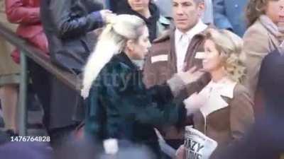 Leaked shooting scene from Joker 2: a female protester yells at Harley Quinn (played by Lady Gaga): you are going to hell. Gaga walks backs to her and kisses her: now we are both going to hell.