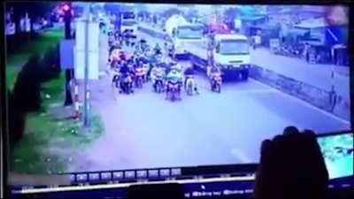 Truck Rams Into People On Bikes At Traffic Signal