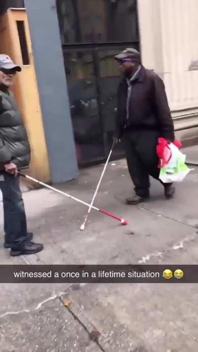 Two blind person collides on the street