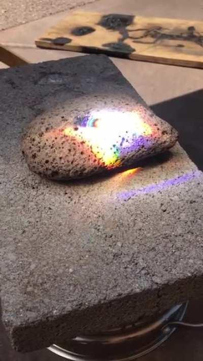 Use big condenser lens to melt down the rock to the magma (about 1100 Celsius degree)