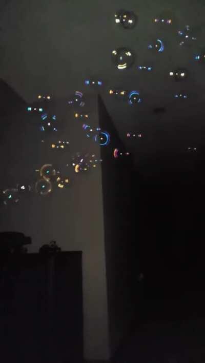 Blowing bubbles in the dark with flash on