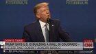 News anchor laughs at Trump announcing wall in Colorado