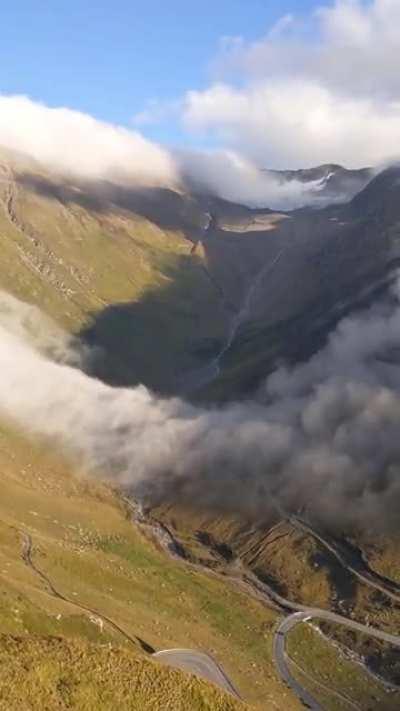 The way the cloud is flowing out of this valley