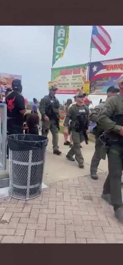 LMPD SWAT parades thru WorldFest. PIO claims they were just “getting food”. Is this how our PD builds/maintains relations & trust with the community? Or just another intimidation tactic?