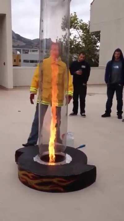 Fire Instructor Demonstrates The Chimney Effect To Trainees