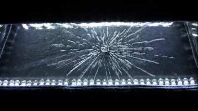 Uranium 235 in a cloud chamber. Those trails are radioactive particles originating from the uranium nucleus.