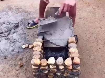 Making a rocket stove with rocks